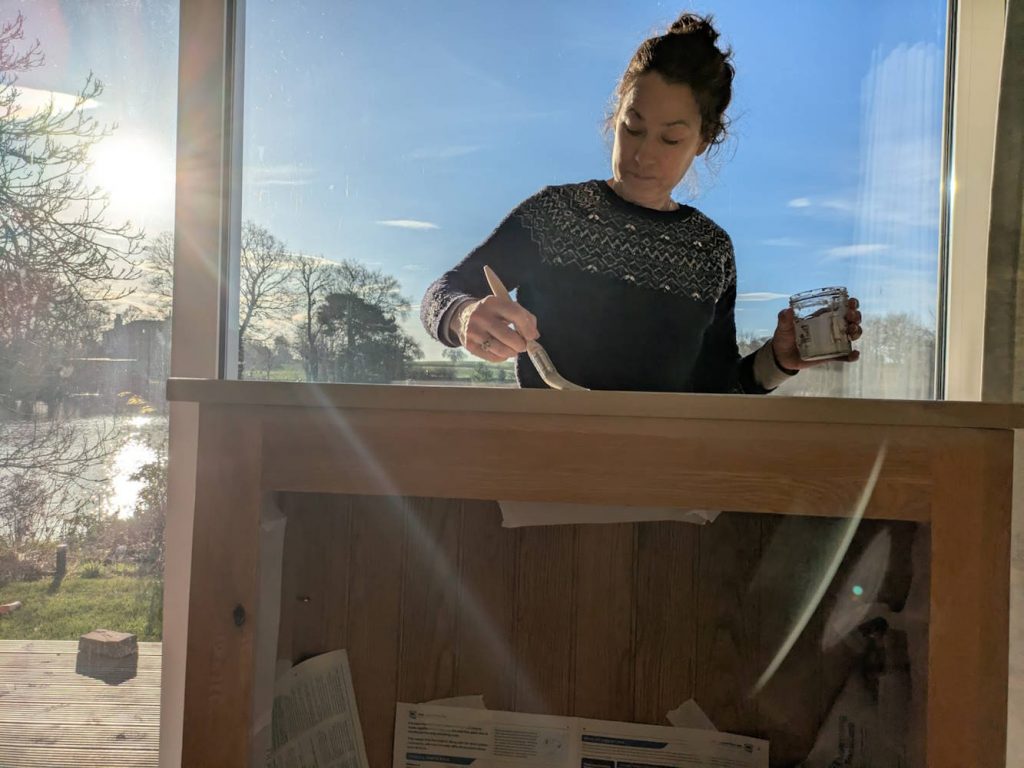 applying a paint wash to wood to remove orange