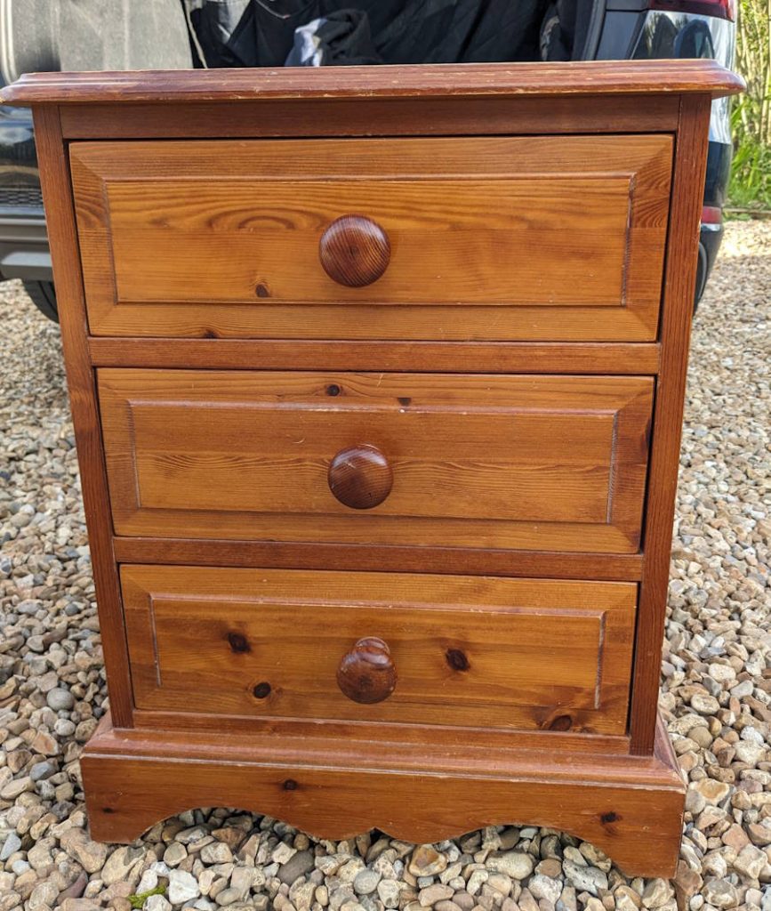 orange pine bedside table in need of upcycling