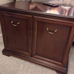 dark wooden cabinet before upcycling