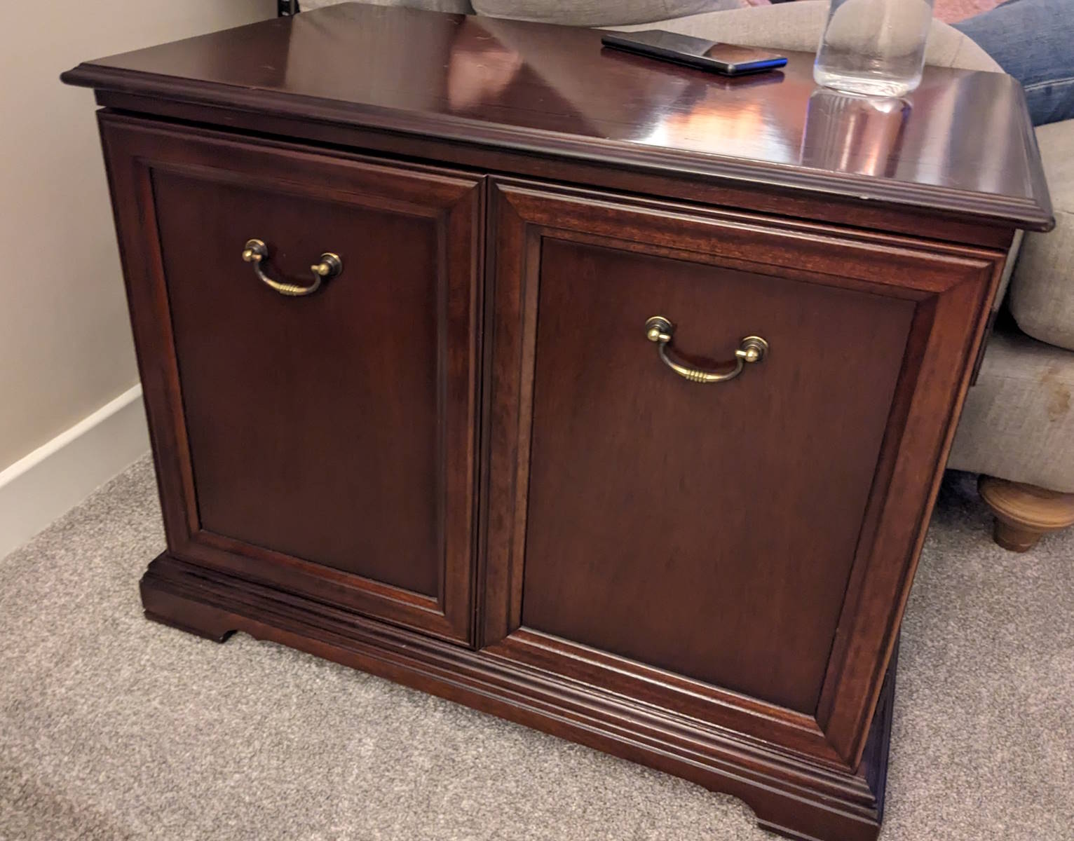 dark wooden cabinet before upcycling