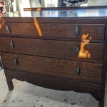 dark wooden chest of drawers