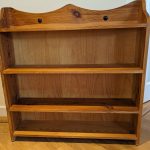 orange pine wooden bookcase