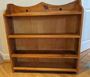 orange pine wooden bookcase