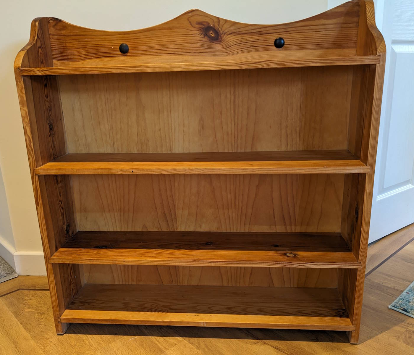 orange pine wooden bookcase