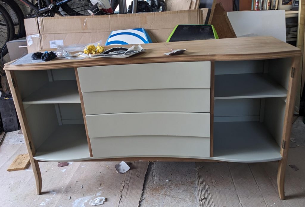 upcycling wooden sideboard with pale green paint