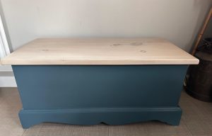 wooden chest painted teal with white washed wooden top