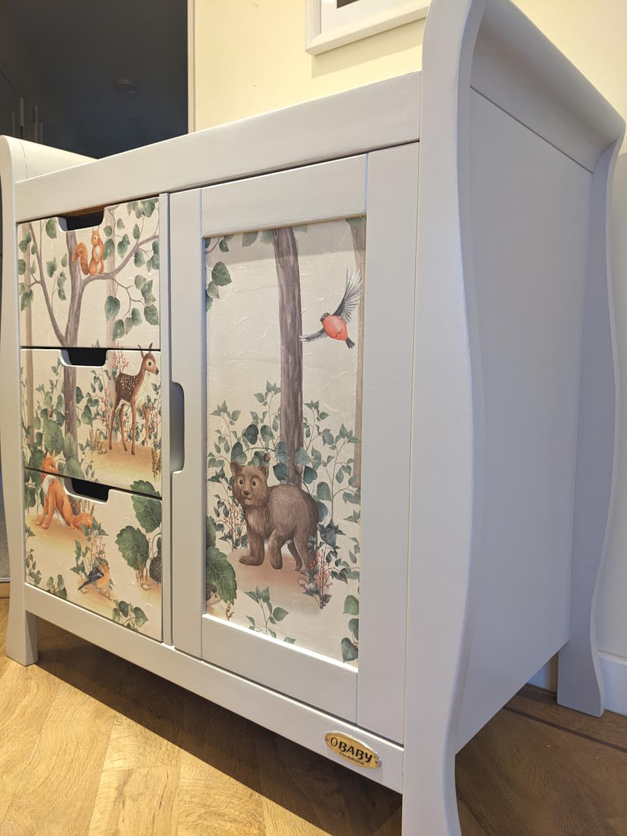 baby changing table with forest animals