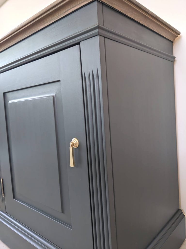 Pair of dark green cabinets
