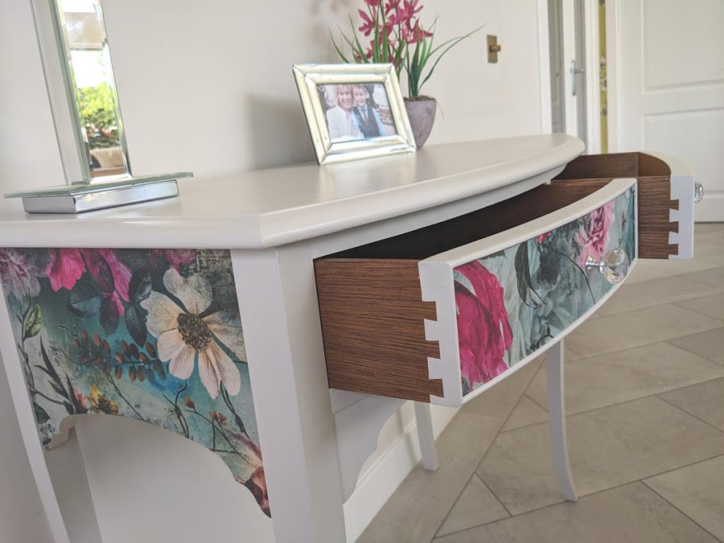 Elegant Pale Grey Console Table with Floral Detailing