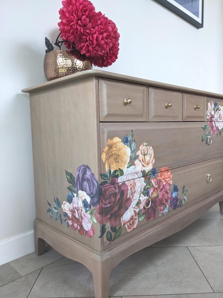 Stag chest of drawers bare wood and floral detail